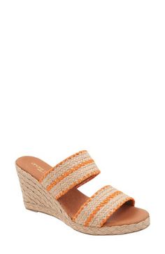 Woven raffia creates a boho aesthetic on an espadrille-inspired slide sandal lofted by a subtle platform and wedge heel. 3" heel; 1/2" platform Cushioned footbed Textile upper/leather lining and sole Made in Spain Orange Synthetic Wedge Sandals For Spring, Casual Orange Platform Wedge Sandals, Orange Open Toe Wedge Sandals For Summer, Orange Open Toe Wedge Sandals For Spring, Spring Orange Open Toe Wedge Sandals, Orange Slip-on Wedge Sandals For Beach, Orange Platform Wedge Sandals For Summer, Orange Slip-on Wedge Sandals For Spring, Orange Slip-on Sandals For Summer