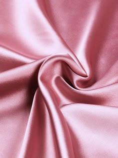 Indulge in the luxurious feel of this 58"/60" wide (147/152 cm) Silk Skin Duchess fabric, also known as Peau de Soie. Its dull satin finish and lightweight drape make it a perfect choice for creating elegant bridesmaid dresses, formal gowns, or any special occasion attire. With a subtle sheen and smooth texture, this high-quality silk fabric offers a sophisticated look and feel. Whether you're a professional dressmaker or an avid sewing enthusiast, this versatile material will elevate your projects with its timeless beauty and exceptional craftsmanship. Elevate your sewing experience and create stunning garments that will turn heads with this premium Silk Skin Duchess fabric. Luxurious Fabric: Crafted from exquisite peau de soie silk, this fabric offers a dull satin finish and a smooth, su Dusty Rose Satin Dress, Pink Leather Fabric, Duchess Fabric, Satin Fabric Texture, Pink Silk Fabric, Pink Silk Dress, Bridesmaid Dresses Formal, Elegant Bridesmaid Dresses, Stunning Prom Dresses