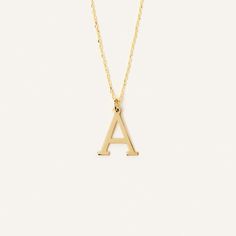 The Personalized Dainty Initial Pendant Necklace in 14K Gold is a stylish and elegant accessory that adds a touch of personalization to any outfit. Made from high-quality 14K gold, this custom necklace features a dainty pendant with a single initial of your choice. The letter pendant hangs from a dainty 14k gold chain. Perfect for gifting, this necklace is a timeless piece that can be worn for any occasion. 14k solid gold handcrafted necklace 100% ethical sourced jewelry Material: 14k Solid Gold 14k Gold Initial Pendant Name Necklace For Formal Occasions, Formal 14k Gold Name Necklace With Initial Pendant, Formal Yellow Gold Name Necklace With Initial Pendant, Classic 14k Gold Custom Necklace, Classic Initial Pendant Necklace, Classic Necklaces With Initial Pendant For Anniversary, Classic Necklaces For Anniversary With Initial Pendant, Classic Yellow Gold Initial Necklace For Personalized Gift, Classic Gold Charm Necklaces With Polished Finish