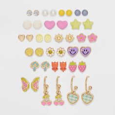 Introduce cute, little pairs of earrings to your kid's accessory collection with the Girls' 20-Pack Spring Earring Set from Cat & Jack™. This set includes 20 pairs of earrings, each featuring playful charms like colorful beads, smileys, sunflowers, strawberries, hearts and stars. The earrings are designed with a comfortable post closure, making them easy to wear. Crafted from recycled zinc and nickel-free metal, these earrings are not only fashionable but also lightweight, ensuring a comfortable Hypoallergenic Kawaii Earrings For Gifts, Nickel-free Kawaii Earrings At Affordable Price, Cheap Kawaii Drop Earrings, Kawaii Style Drop Earrings, Kawaii Multicolor Dangle Earrings, Hearts And Stars, Spring Earrings, Kids Earrings, Hoop Earring Sets