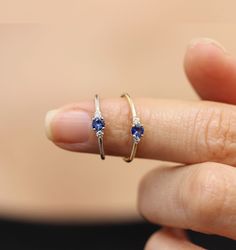 Three stones sapphire with diamond prong setting ring. Simple classic diamond ring ❮❮ Details ❯❯ ◆ Handmade in our Manhattan Studio. ◆ Center Stone : 100% Natural Emerald , approx. 0.17~0.19carat ◆ Side Stones : Diamond, Approx. 0.04 total carat weight − Conflict-Free − Diamond Color : G − Diamond Clarity : SI1 ◆ Band Width : Approx. 1.25mm Round ◆ Material : 14K Yellow Gold,Rose Gold, White Gold. ◆ Sizes available : 3 - 9 (Pls send us convo for over size 9, Priced upon request) ✔︎ Make sure to Luxury Minimalist Sapphire Ring, Diamond Open Ring With Birthstone, Open Diamond Ring With Birthstone, Diamond Birthstone Open Ring, 14k Gold Sapphire Diamond Ring With Vvs Clarity, Sapphire Diamond Promise Ring In 14k White Gold, Sapphire Stackable Promise Rings With Gemstones, Sapphire Ring With Diamond Accents, Lab-created Sapphire Ring With Diamond Accents In Diamond White