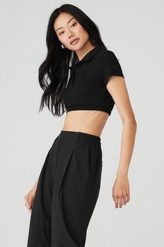 Give off the ultimate prep school chic vibes in the Cropped Prestige Polo. Its super-cropped, fitted silhouette will get you cool points at yoga class and with all your friends when you sport it for your next outing. Pair it with any high-waist bottom in your collection. Super-cropped, fitted silhouette Button-up with cool collar Designed & uniquely fit to flatter every size Wear-tested by our in-house team for the perfect fit Stretch Athleisure Crop Top For Night Out, Sporty Black Crop Top For Summer, Sporty Stretch Crop Top For Night Out, Trendy Black Crop Top For Workout, Alo Yoga Cropped Crop Top For Workout, Alo Yoga Cropped Top For Workout, Alo Yoga Crop Top For Workouts, Alo Yoga Cropped Athleisure Crop Top, Alo Yoga Stretch Crop Top