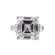 A truly spectacular piece featuring a treasure from the J. Birnbach vault. This magnificent ring features a 21.13 carat GIA certified Asscher cut of H color and VS1 clarity. Tapered baguettes are a timeless accent to the center diamond-this pair totals approximately 1.50 carats. The ring is crafted in platinum, and destined to be an heirloom piece beloved for generations. Custom engraving and sizing available. Bold Engagement Rings, Ascher Cut, Radiant Cut Diamond Ring, Diamond Engagement Rings Cushion, Cushion Diamond Ring, Brilliant Cut Diamond Ring, Pear Diamond Engagement Ring, Jewelry Rendering, Emerald Cut Diamond Engagement