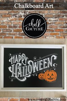 a sign that says happy halloween on it next to a brick wall with the words chalkboard art