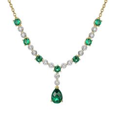 Add timeless elegance to your jewelry collection with this 14k Gold Over Silver Lab-Created Emerald Necklace. Add timeless elegance to your jewelry collection with this 14k Gold Over Silver Lab-Created Emerald Necklace. FEATURES Drop length: 0.65'' Chain length: 14 in. Chain type: cable Clasp: lobster-claw Nickel free Metal: sterling silver Plating: 14k gold flash plated Finish: polished Packaging: boxedSTONE DETAILS Stone type: lab-created emerald, lab-created white sapphire Total weight: 1 3/8 ct. Center stone weight: 5/8 ct. Center stone size: 7x5mm Shape: pear, shape: round Setting: prong Gemstones may have been treated to enhance their appearance. Special care may be required. Please visit our Gemstone Treatment & Special Care Guide for more information. Size: 13". Color: Yellow. Gend Lab Created Emerald, Emerald Necklace, White Sapphire, Chain Lengths, Timeless Elegance, Emerald, Gold Tones, Sapphire, Statement Necklace