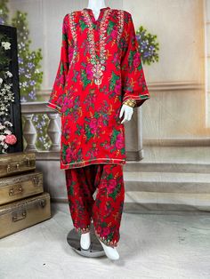 Embrace the vibrant cultural heritage of Sindh with this exquisite kurta salwar set. This kurta and salwar is adorned with intricate tilla embroidery, showcasing delicate gold threads that form traditional motifs. Complementing the tilla work are sparkling mirror embellishments, adding a touch of glamour and shimmer to the ensemble. The dress, crafted from soft, comfortable cotton fabric, provides a perfect balance of tradition and modern elegance. Ideal for festive occasions and cultural celebr Designer Festival Lawn Suit With Dabka Work, Unstitched Lawn Suit With Traditional Drape For Festive Occasions, Designer Nida Lawn Suit With Dabka, Designer Jamawar Lawn Suit For Festivals, Traditional Festive Unstitched Suit With Dabka, Traditional Unstitched Suit With Dabka For Festive Occasions, Unstitched Shantoon Lawn Suit For Festive Occasions, Festival Kurta With Dabka Work In Nida Fabric, Designer Cambric Lawn Suit With Traditional Drape