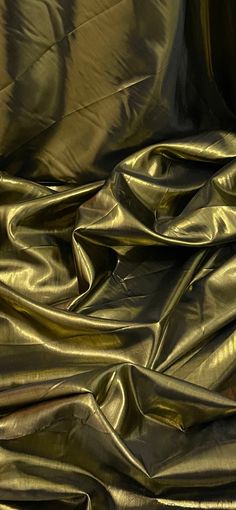 an up close shot of shiny gold fabric