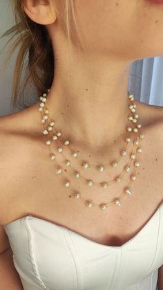 One of a kind three layer stainless steel necklace with gold color chain and fresh water pearls. Stainless steel chain with baroque bead 5-6mm Necklace of approximately 55cm long layer / 50cm middle layer / 45cm short layer, stainless steel clasp and extension chain of 6cm. Can be paired with earrings S-G-021 ✦This is a perfect gift for yourself or someone you love. ✅ Please take note of the sizes and dimensions as they may appear larger or smaller in photos, on certain monitors or computers. As Party Layered Pearl Necklace With Pearl Chain, Multi-strand Layered Pearl Chain Necklace For Parties, Multi-strand Layered Pearl Necklace For Party, Gold Layered Necklace With Pearl Chain For Party, White Pearl Double Strand Layered Necklace, White Double Strand Pearl Layered Necklace, Gold Multi-strand Pearl Necklace, Gold Multi-strand Pearl Chain Necklace, Multi-strand Pearl Chain Necklace