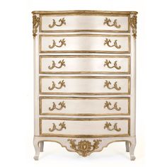 a white and gold chest of drawers