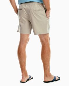 Our new Sun Farer shorts were made for versatility and comfort thanks to the elastic waistband and soft cotton fabric. You’ll want to grab a pair in every color. Style: 8640 6-inch inseam 97% Cotton 3% Stretch Model is 6'2 with a 32" waist wearing a M Fully elasticated waistband with exterior drawcord Heat seal main label Front hand pockets Back welt pockets Southern Tide embroidery on back pocket Soft to touch Machine wash cold with like colors. Do not use softener. Do not bleach. Tumble dry lo Preppy Boys Outfits, Main Label, Preppy Boys, Southern Tide, Sophisticated Dress, Cute Swimsuits, Comfy Sweaters, Sand Dollar, Khaki Shorts