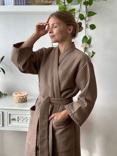 "Waffle Hand Made Kimono style Bathrobe Wrap yourself into the most comfortable robe ever. Breathable, high-quality, cosy, and sustainable. Perfect as a gift for any occasion. Made from 100% pure organic Netherlandish cotton. Oeko-Tex Standard 100 Certified ® Enjoy the spa feeling at home! * Soft and comfortable * Absorbent and quick drying * Lightweight and breathable * Durable * Hypoallergenic * 100% cotton waffle  * Easy garment care SIZING Bathrobes are designed for a loose fit: S/M:  - total length (center back length) - 115 cm/45\"; - bust - 60 cm/23.6\"; L/XL:  - total length (center back length) - 115 cm/45\"; - bust - 66 cm/26\"; Models wearing size S/M Girl height 5'61 /168cm C O L O R S: We have a wide selection of colors: https://www.etsy.com/shop/KajStore?ref=seller-platform-m Robe For Her, Bathrobe Aesthetic, Feeling At Home, Robe For Women, Women Robe, Mode Kimono, Women's Robe, The Embrace, Aesthetic Coffee