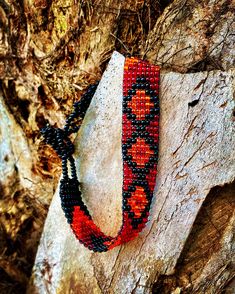 "Red Seed Bead Bracelet delicately handmade by an indigenous Mayan family of women in Guatemala. This is a must have even as an every day accessory! Makes for a great birthday gift, Christmas gift, holiday gift, stocking stuffer, friendship bracelet and especially a \"just because\" gift! These bold glass bead bracelets never seize to impress! *Please note that all of our items are handcrafted and unique to each piece. Also, colors may vary slightly based on your device. Like what you see here? Traditional Hand Wrapped Adjustable Beaded Bracelets, Handmade Traditional Jewelry For Friendship, Traditional Handmade Jewelry For Friendship, Handmade Adjustable Traditional Bracelets, Traditional Handmade Adjustable Bracelets, Handmade Traditional Adjustable Bracelet, Traditional Handmade Adjustable Bracelet, Artisan Beaded Braided Bracelets For Festivals, Red Spiritual Bracelet With Black Beads