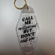 an acrylic keychain that says, call me artful but don't call me