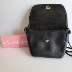 "Vintage Coach Quincy Bag Black leather with brass hardware Roomy interior with slip pocket covered by a flap and secured with a turnlock Made in the United States #B5D-9919 Measures: 9\"L, 7\"H, 3\"W Strap measures: 52\" Can be worn over shoulder or crossbody if possible Made in the United States Cleaned, conditioned and ready to wear! Questions? Just ask More vtg coach styles/colors also available Lr" Classic Pouch Shoulder Bag With Magnetic Closure, Classic Leather Bag With Cc Turnlock Closure, Classic Double Flap Shoulder Bag With Cc Turnlock Closure, Classic Shoulder Bag With Cc Turnlock For Daily Use, Classic Crossbody Satchel With Snap Closure, Classic Shoulder Bag With Cc Turnlock And Double Flap, Classic Daily Use Shoulder Bag With Cc Turnlock Closure, Travel Double Flap Bag With Cc Turnlock Closure, Travel Flap Bag With Cc Turnlock And Double Flap