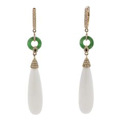 A stylish and chic pair of drop earrings! They feature 27.35 carats of smooth drop-shaped white onyx. Accenting them are 0.41 carats of round brilliant-cut diamonds which add sparkle and brilliance to the piece. Finishing the earrings are two jadeite jade hoops which add length and contrast in color to this unique piece. Made in 18k rose gold and ready to be enjoyed.      Length: 2.5 inches    Weight: 9.2 grams Luxury White Earrings With Pave Setting, Luxury White Pave Set Earrings, Classic White Teardrop Earrings With Diamond Accents, Timeless White Pear-shaped Diamond Earrings, Luxury Teardrop Diamond Earrings, White Drop Diamond Earrings, Classic White Briolette Earrings, White Drop Diamond Earrings Fine Jewelry, White Pear-shaped Diamond Earrings