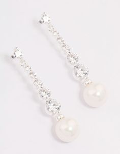 Add a hint of sparkle to your look with premium pieces from our bestselling Cubic Zirconia Collection! Elevate your style with these Silver Cubic Zirconia Pearl Drop Earrings, designed with delicate crystals and simple pearls for a sophisticated finish to your look. Pair these earrings with a set of simple pearl studs for a cohesive finish to your stack. | Lovisa Silver Cubic Zirconia Pearl Drop Earrings, Clear Simple Pearl, Favorite Rings, Pearl Studs, Pearl Drop Earrings, Pearl Drop, Wedding Earrings, Ring Necklace, Elevate Your Style, Piercings