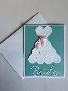 a bride card with a teddy bear on the front and pink ribbon at the bottom