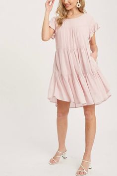 Elevate your everyday with this easy-to-wear tiered baby doll dress! Product Details: Color: Baby Pink Woven dress Round neckline Drop Shoulder with ruffle hem sleeves Side seam pockets Tiered flounce hem Flowy silhouette Lined Lightweight Keyhole at back Button closure Fabric Content: 65% Rayon / 35% Polyester Denim Chic, Hair Clothes, Ruffle Hem Dress, Woven Dress, Wear Pink, Hem Dress, Babydoll Dress, Baby Doll, Ruffle Hem