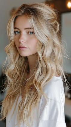 24 Prom Hairstyles That Exude Grace and Class Low Maintenance Wedding Hair, Wedding Hair Relaxed, Loose Beach Waves Wedding Hair, Retro Bride Hairstyles, Half Up Half Down Wedding Hair Long Blonde, Quarter Up Wedding Hair, Side Part Hairstyles Wedding, Bridesmaid Hair Volume, Halfup Hairstyle For Long Hair Wedding