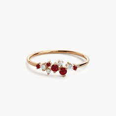 Made to Order. 
Gold Kt: 14K Solid Gold
Custom Gold Color: Rose Gold, Yellow Gold, White Gold
Diamond Cut: Round 
Gemstone: White Diamonds & Ruby
Diamond Color & Clarity: G Color Si Clarity
Setting Type: Prong Setting
Number of Stones: 9
Stone Size: 1pc Ruby 2.3MM / 1pcs Ruby 2.1MM / 2pcs Diamonds 2.0MM / 3pcs Ruby 1.3MM / 2 Pcs 1.3MM Diamonds
Total CTW: 0.35ctw
Width of Band: 1.25MM Ruby Ring Simple, Ruby Ring Designs, Gold Ruby Ring, Ruby Ring Vintage, Ruby Ring Gold, Ruby Rings, Ruby Diamond Rings, Gold Gemstone Ring, Ruby Jewelry