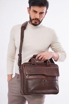 - Our product is 100% genuine leather. - It is produced in master hands with quality materials and delicate handwork. - Dimensions 29 x 39 cm Rectangular Business Briefcase With Leather Strap, Brown Smooth Grain Business Laptop Bag, Leather Shoulder Bag Briefcase With Smooth Grain, Brown Soft Leather Briefcase For Business, Brown Leather Business Bags, Brown Smooth Grain Laptop Bag For Business Trips, Leather Laptop Bag In Cognac For Business Trips, Cognac Leather Laptop Bag For Business Trips, Leather Briefcase With Smooth Grain For Daily Use