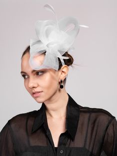 Introducing the Jayla Fashion Veil Fascinator, the perfect accessory to elevate your fashion game. This exquisite fascinator features a delicate veil that adds a touch of elegance to any outfit. Be the envy of every event with its unique design and impeccable craftsmanship. QualityMade with quality materials for endurance. ImportedHTH2676 Spring Party Tulle Headpiece, Elegant Adjustable Veil For Party, Fitted Tulle Mini Hats For Party, Summer Party Tulle Headpiece, Elegant White Evening Veil, Party Tulle Mini Hats, Summer Party Headpieces Made Of Tulle, Tulle Headpiece For Kentucky Derby Party, Fitted Tulle Headpieces For Parties