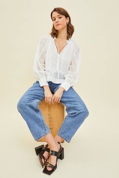 Get ready to turn heads in the Clara Blouse! This classy and feminine top is perfect for summertime. Pair it with denim, whether it's a mini skirt or jeans, for a cute and effortless look. Don't miss out on this stylish option! Trendy Denim Tops For Day Out, Spring Daywear Peasant Top With Relaxed Fit, Denim Tops For A Day Out In Spring, Feminine Relaxed Fit Peasant Top For Daywear, Spring V-neck Lace Top Blouse, Trendy Denim Blouse For Day Out, Non-stretch Casual Summer Blouse, Chic Cotton Peasant Top For Summer, Chic Relaxed Fit V-neck Peasant Top