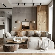 a living room filled with lots of furniture and decor on top of a hard wood floor