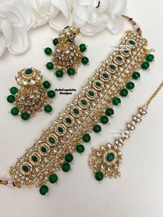 Gorgeous Kundan Choker comes with Jhumki Earrings and Tikka/ Indian Jewelry/Unique Polki and Kundan Jewelry/green   All items are shipped from Brampton, Ontario, Canada. If you need your item by a certain day, please reach out to us for express delivery option before placing the order so that we can update the shipping for you. Standard shipping/delivery timeline Below are the delivery timeline estimates. We dispatch all orders by the next business day. ---> USA delivery timeline * 3-5 business Dark Green Pakistani Jewelry, Luxury Green Kundan Traditional Wear, Luxury Green Bridal Necklace For Diwali, Luxury Green Festive Choker, Green Chandbali Tikka For Celebration, Festive Heavy Green Tikka, Green Stone Work Jhumkas For Celebration, Green Wedding Sets With Tilla Embroidery, Green Kundan Temple Jewelry Set