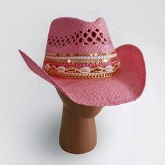 "Channel your inner Dolly Parton with this show-stopping pink straw hat that's more than just a hat, it's a STATEMENT.  Here's what makes this hat the belle of the ball : **  Glitz & Glam  Forget plastic! This hat is crafted from genuine straw, naturally breathable and oh-so-chic. But the real showstopper is the dazzling embellishment: rows of sparkling rhinestones that catch the light like a million pink diamonds, delicate pearls, and gleaming gold accents that'll make you the envy of every rod Brimmed Mini Hats For Spring Rodeo, Summer Rodeo Mini Hat With Curved Brim, Western Mini Hats For Summer Rodeo, Western Mini Hats For Summer Country Events, Western Style Mini Hats For Summer Country Events, Country Style Mini Hats With Short Brim For Summer, Novelty Adjustable Wide Brim Hats, Country Style Mini Hat With Short Brim For Summer, Summer Rodeo Mini Hat With Short Brim