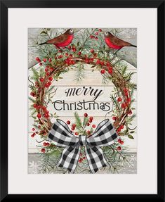 a christmas wreath with two birds on it and the words merry christmas written in red