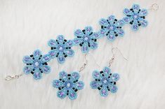 This beautiful and coquettish light blue flower bracelet&earrings set will keep you in good mood for all day long. Lenght of the bracelet is 18 cm, lenght of the earrings is 5.5 cm. It is so feminine and springlike! It can be an excellent gift. Blue Flower Bracelet, Light Blue Flowers, Snake Jewelry, Rainbow Earrings, Gold Necklace Women, Seed Bead Necklace, Flower Bracelet, Jewelry Inspo, Blue Flower