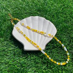 This yellow seed bead necklace is part of our spring collection! These colors are sure to give you a reminder of ice-cold lemonade! This necklace is a personal favorite! Hope you enjoy this piece as much as we do! Casual Yellow Round Bead Necklaces, Casual Yellow Beaded Necklaces With Round Beads, Spring Beach Beaded Necklaces With Round Beads, Yellow Necklaces With Colorful Beads For Summer, Yellow Round Beads Necklace For Summer, Yellow Round Bead Necklaces For Summer, Summer Yellow Beaded Necklaces, Neon Yellow Summer Beach Jewelry, Tiny Yellow Beads For Summer