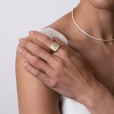 Our gleaming Suburst Cushion signet ring in 14k yellow gold, from Stardust by G.St. glows with a beautiful satin finish and showcases a display of flush set round brilliant diamonds, taking your ensemble from simple to stunning. • 14k yellow gold with satin finish • 0.52tcw round brilliant diamonds (G-H color, SI clarity) • Band width: 14mm, band thickness: 2mm • In stock in size 6.5. Additional sizes will be made to order. Timeless Yellow Gold Signet Ring With Brilliant Cut, Elegant Gold Engraved Ring With Diamond Accents, Elegant Yellow Gold Engraved Ring With Diamond Accents, Elegant Engraved Yellow Gold Ring With Diamond Accents, Luxury Yellow Gold Signet Ring With Single Cut Diamonds, Fine Jewelry Yellow Gold Signet Ring With Diamond Accents, Yellow Gold Signet Ring With Diamond Accents, 14k Yellow Gold Pave Setting Signet Ring, Classic 14k Gold Signet Ring With Pave Setting