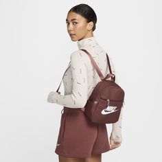 Upgrading a heritage favorite, the Nike Sportswear Mini Backpack is made with at least 55% recycled polyester fibers. It features a felt-lined accessories pocket and a premium webbing handle and shoulder straps. Nike Mini Backpack, Mochila Nike, Nike Backpack, Mini Mochila, Women Lifestyle, Cute Swag Outfits, Swag Outfits, Mini Backpack, Nike Sportswear