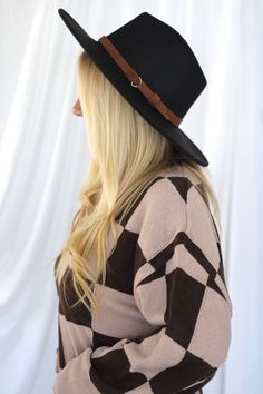 Details: ﻿Black wide brim panama hat with brown strap! Material: 65% COTTON. 35% POLYESTER. Chic Brown Brimmed Boater Hat, Chic Adjustable Brown Fedora, Chic Brown Boater Hat With Short Brim, Chic Brown Short Brim Boater Hat, Fall Fedora Panama Hat For Rodeo, Black Brimmed Panama Hat For Rodeo, Chic Adjustable Boater Hat For Fall, Chic Black Fedora With Flat Crown, Fall Rodeo Fedora Panama Hat