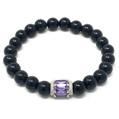 Precious looking black onyx & purple striped agate gemstones bracelets with a platinum plated purple bead• elegant, simple and meaningful! Black Onyx absorbs and transforms negative energy, and helps to prevent the drain of personal energy. Black Onyx aids the development of emotional and physical strength and stamina, especially when support is needed during times of stress, confusion or grief. The 2 piece set includes: 1x 8mm black onyx bracelet 1x 8mm purple striped agate bracelet ** the brac Elegant Agate Beaded Bracelets For Gift, Elegant Amethyst Crystal Bracelet, Elegant Purple Beaded Bracelets As Gift, Elegant Purple Beaded Bracelets For Gift, Elegant Purple Beaded Bracelet For Gift, Elegant Purple Beaded Bracelet Gift, Elegant Purple Crystal Bracelet For Healing, Elegant Purple Crystal Bracelet, Elegant Agate Beaded Bracelets With Natural Stones