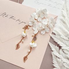 Dainty Silk Flower Earrings With Gold Leaves and Pearls - Etsy Poland Elegant Handmade Flower Bridal Earrings, Elegant Bridal Flower Earrings With Handmade Flowers, Elegant Bridal Earrings With Handmade Gold Flowers, Elegant Bridal Earrings With Flower Decoration, Elegant Gold Bridal Earrings With Handmade Flowers, Elegant Bridal Earrings With Flower Decoration For Wedding, Elegant Flower Bridal Earrings For Wedding, White Dangle Earrings For Bridesmaids, Rose Gold Jewelry With 3d Flowers For Wedding