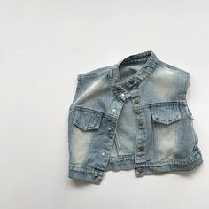 Add a touch of cool and casual style to your little one's wardrobe with our Light Wash Denim Vest. Made from high-quality cotton, this unisex vest is designed for comfort and durability. With a regular fit and a thick fabric, it's perfect for any season. The O-Neck collar and solid pattern add a trendy twist to the casual style. Suitable for children aged 1-6 years, this versatile vest is a must-have addition to their everyday outfits. 😎👕👧👦 #DenimStyle #FashionForKids Specifications: Materia Light Wash Denim, Neck Collar, Height And Weight, Clothing Size Chart, Denim Vest, All Brands, Skin Protection, Denim Fashion, Everyday Outfits