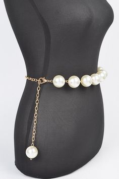 Elevate your outfit with our Iconic Pearl Station Chain Belt. Indulge in the luxury of genuine pearls and a delicate chain, adding a touch of elegance to any look. Complete your wardrobe with this timeless and sophisticated accessory. One Size Width - 1.25" Length - 50" PVC, Faux Pearl, Mix Metal Lead & Nickel Compliant Boutique Homes, Delicate Chain, Chain Belt, Handbag Shoes, Beauty Bar, Mixed Metals, Faux Pearl, Men Dress, Mother’s Day