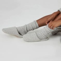 These are not your grandma’s slippers! With a cozy oversized look and feel, slip into our Closed Toe Kashwére Lounge Slippers and instantly feel enveloped in a delightful, warm hug for your feet. The Kashwére Lounge Slippers are comfortably casual, yet luxurious for an effortlessly refined feel. Woven with a two-toned heathered finish, these slippers are sleek, oh so soft, and perfect for travel. Customize your warmth by wearing them with or without our signature, Kashwére Socks depending on the Cozy Indoor Slippers With Soft Texture, Cozy Soft Texture Slip-on Slippers, Cozy Slip-on Slippers With Soft Texture, Cozy Indoor Slippers, Cozy Round Toe Slippers For Relaxation, Cozy Comfortable Indoor Slippers, Super Soft Slippers For Winter Lounging, Super Soft Slippers For Lounging In Winter, Cozy Super Soft Slippers For Relaxation