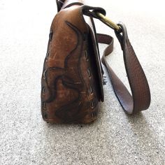 "Beautiful Vintage 60s or 70s Saddle Leather Handbag Purse Great Vintage Condition with Amazing Patina - unique hardware, and leather stitching, inside leather pocket Rough Measurements: Width: 10 1/2\" Length (the bag itself not including strap or ring handles): 9\" Depth (slightly Stretched): 4\" Will ship out between 1-3 business days once the payment has been made. Please message me w/ any questions. All sales final. And please check out my other vintage shirts!! thank you!" Vintage Brown Crossbody Flap Bag, Retro Brown Saddle Bag Satchel, Retro Brown Saddle Satchel Bag, Retro Brown Satchel Saddle Bag, Retro Leather Flap Bag For Daily Use, Retro Leather Saddle Bag In Satchel Shape, Vintage Crossbody Flap Bag, Retro Leather Satchel Saddle Bag, Vintage Satchel Flap Bag For Daily Use