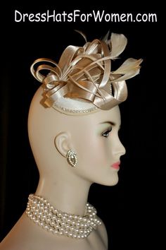 Champagne Beige Satin Wedding Fascinator Cocktail Hat For Women. Couture Bespoke 1920's Flapper Era Designer Fashion Hat - Trimmed With A Large Looped Champagne Beige Satin Bow, Accented With Delicate Beige Feathers, Embellished With A Beautiful Row Of  Rhinestones. This Satin Wedding Fascinator Is Held In Place By An Ali gator Hair Clip. This Is A Beautiful Headpiece For A Bride Or Wedding Guests. Also Suited For Mother Of The Bride Or Groom.

Measurements: The Fascinator Satin Base Measures 13 Fitted Bridal Accessories For Royal Ascot Party, Elegant Fitted Headband With Structured Crown, Fitted Bridal Accessories For Kentucky Derby Party, Silver Fitted Fascinator For Evening, Elegant Mini Party Hats With Pinched Crown, Elegant Adjustable Headband With Structured Crown, Elegant Fitted Bridal Accessories For Party, Elegant Adjustable Top Hat, Elegant Party Headpiece With Structured Crown