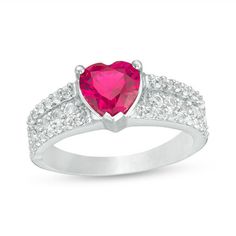 With sparkle to spare, this beautiful heart ring is a dazzling gift for any occasion. Crafted in sterling silver, this precious style showcases a 7.0mm heart-shaped lab-created bright red ruby atop three shimmering rows of lab-created white sapphires. Buffed to a brilliant luster, this ring is destined to be adored. Custom-made to fit her ring size. Sterling silver rings cannot be resized after purchase. Valentine's Day Silver Heart Birthstone Ring, Heart-shaped White Gold Birthstone Ring For Valentine's Day, Silver Birthstone Ring With Prong Setting For Valentine's Day, Silver Birthstone Ring For Valentine's Day, Valentine's Day Silver Birthstone Ring With Prong Setting, Dazzling Promise Ring For Valentine's Day, Silver Heart Ring With Accent Stones For Valentine's Day, Valentine's Day Silver Heart Ring With Accent Stones, Dazzling Valentine's Day Promise Ring