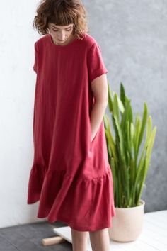 "Raspberry linen dress with frill hem. -------------------------------------------------------------------------------------------------------- ABOUT: Beautiful handmade raspberry linen dress with frill hem. Made from locally manufactured pre-washed linen fabric and is perfect for all seasons. Can be made with 3/4 length or long sleeves. *Similar item: https://www.etsy.com/listing/588526692/striped-linen-dress-loose-linen-dress?ref=shop_home_active_149&frs=1 *Find more about us: https://www. Short Sleeve Ruffle Hem Dress For Beach, Casual Summer Ruffle Dress With Layered Hem, Casual Beach Dress With Layered Hem, Summer Linen Midi Dress With Ruffles, Relaxed Fit Midi Dress With Ruffles For Summer, Summer Midi Dress With Ruffles Relaxed Fit, Relaxed Fit Summer Midi Dress With Ruffles, Summer Dresses With Ruffle Hem And Relaxed Fit, Summer Linen Dress With Ruffle Hem