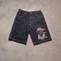 "You are looking at a great pair of vintage South Boyz shorts. Excellent vintage condition. Tag size 38. Please see actual measurements below.  Waist: 36\" Rise: 14\" Inseam: 11\" Outseam: 24\" If you would like to see additional photos or have any other questions, please do not hesitate to ask, and thanks for looking! Shipping disclaimer: All domestic orders under 16oz ship USPS Ground Advantage. All domestic orders over 16oz ship USPS priority mail. All international orders under 4lbs ship via Etsy's Global Shipping Program. All international orders over 4lbs ship USPS priority mail. If international buyers wish to have a package that is under 4lbs shipped via priority mail, please contact me before purchasing so that I can adjust the shipping charges. Insurance can be added to any domes Y2k Cotton Jean Shorts For Streetwear, 90s Short Streetwear Bottoms, Retro Shorts With Pockets For Streetwear, 90s Short Length Streetwear Bottoms, 90s Style Short Length Streetwear Bottoms, Y2k Jean Shorts For Streetwear, Y2k Style Short Jean Shorts For Streetwear, Y2k Style Streetwear Shorts, Y2k Style Relaxed Fit Streetwear Shorts