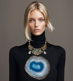 Tebessa Agate Statement Necklace  Featuring a large hand-polished statement natural stone with pearl-look, hand-carved buddha stones; sitting below an antique mixed-metal choker with semi-precious stones.  Oversized, unique and attention-commanding. Luxury Beaded Agate Necklace With Stones, Luxury Hand-strung Agate Jewelry, Luxury Agate Jewelry Statement Piece, Elegant Long Agate Crystal Necklace, Unique Gemstone Necklace With Mother Of Pearl, Agate Amulet Necklace With Large Pendant, Unique Mother Of Pearl Pendant Necklaces, Unique Mother Of Pearl Pendant Necklace, Elegant Agate Necklace With Large Pendant