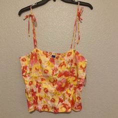 Questions? Leave A Comment Below! Yellow Spaghetti Strap Camisole For Summer, Fitted Yellow Camisole For The Beach, Yellow Spaghetti Strap Tank Top For Summer, Yellow Spaghetti Straps Tank Top For Summer, Fitted Yellow Sleeveless Camisole, Summer Yellow Camisole With Spaghetti Straps, Yellow Spaghetti Straps Summer Camisole, Yellow Floral Print Tank Top For Spring, Yellow Summer Beach Camisole