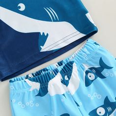 Includes: Top & Trunks Material: Polyester Gender: Boys Pattern: Sharks Sleeve Length: Long Summary: Toddler Kids Long Sleeve Shark Swim Top with Matching Shorts 2 Piece Swimsuit Playful Swimwear Set For Summer, Playful Summer Swimming Sets, Fitted Cartoon Print Sets For Playwear, Summer Loungewear Sets With Cartoon Print, Playful Stretchable Summer Sets, Playful Stretch Summer Sets, Playful Sleeveless Sets With Cartoon Print, Playful Sleeveless Cartoon Print Sets, Casual Blue Sets With Cartoon Print