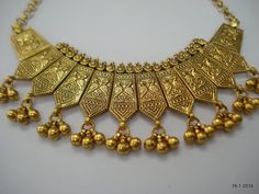 "Traditional Design Sterling Silver gold vermeil gold gilded gold plate Choker Necklace From Rajasthan India. Great Handmade Design, Good For Jewellery Collection. Note - Please check pictures carefully for more detail. Subject : Peacock. Length - 42 cm (16.5\") we can adjust the length. width with bells - 5.2 cm (2\") weight - 79 grams material - good sterling silver. gold plate on top." Antique Gold Temple Necklace With Intricate Design As Gift, Traditional Gold Pendant Jewelry, Elegant Antique Gold Temple Necklace Gift, Elegant Antique Gold Temple Necklace, Traditional Gold Temple Necklace Pendant, Ornate Antique Gold Temple Necklace As Gift, Gold-plated Yellow Necklaces With Intricate Design, Yellow Gold Plated Necklaces With Intricate Design, Gold Temple Jewelry Necklaces As Gift